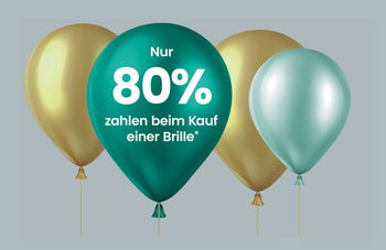 Zu sehen ist ein Bild mit goldenen und Grünen Ballons mit dem Schriftzug: Nur 80% zahlen beim Kauf einer Brille.